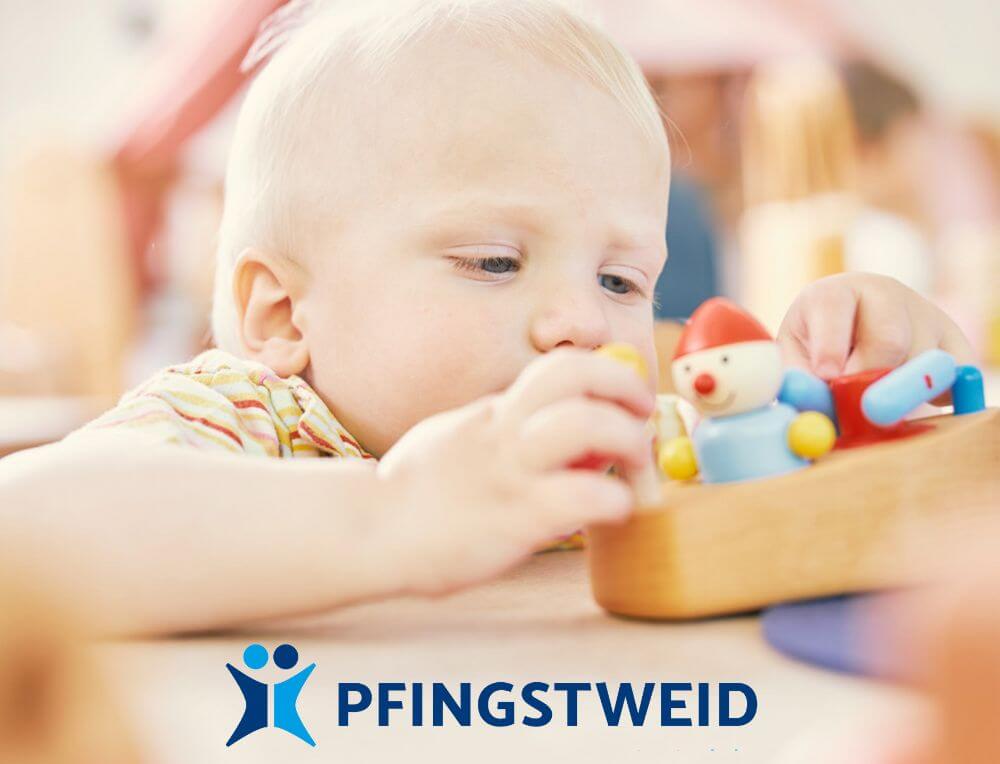 Baby playing with Pfingstweid Wooden Boat Toy from Wooden Playroom in Australia