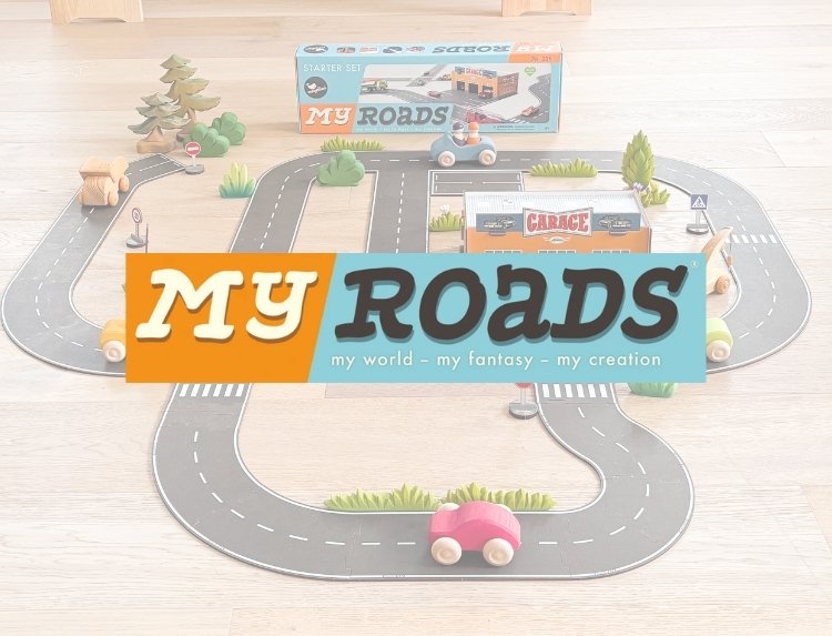 Toy road set with 'My Roads' branding on a light background