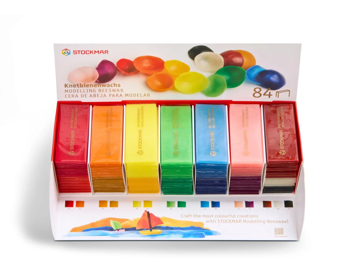 Box of Stockmar modeling wax bars in various colors on a white background